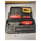 Drill bits and driver heads