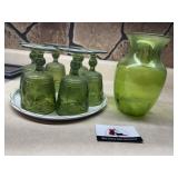 Green glasses and vase