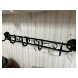 Horseshoe coat rack