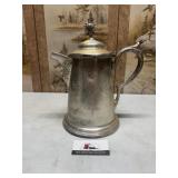 Ornate metal pitcher