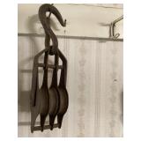 Antique metal barn pulley