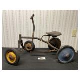 Vintage metal trike tires marked Dubuque Iowa