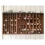 Miniatures on wall decor shelving
