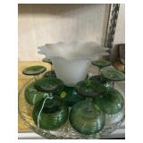 Green goblets and ornate vase
