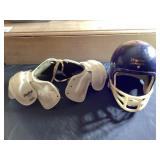 Vintage football helmet and shutter pad