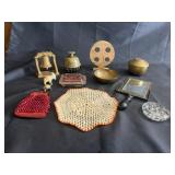 Elephant claw bell, brass bowls, antique mirror,