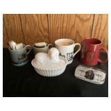 Assorted cups and advertising paperweight to