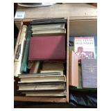Large wooden box of vintage books