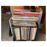 Assorted records and wooden storage