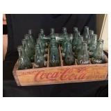 Vintage yellow wooden Coca-Cola 24 bottle