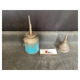 Antique oil cans