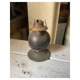Small metal oil lamp