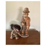 Wood carving and humerus figurine
