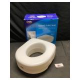 Raised toilet seat looks new