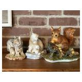 Wolf, polar bear, and squirrel, ceramic figurines