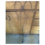 Vintage metal rug beater