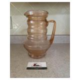 Pink depression glass ringed pitcher