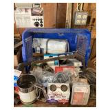 Basket of zip ties screws saw staples and