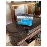 Co-op automatic battery charger