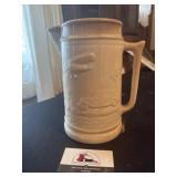 Red wing pitcher