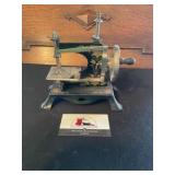 Vintage mini sewing machine
