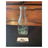 Rosedale milk glass bottle