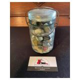 Vintage jar of thimbles