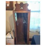 Curved glass curio cabinet