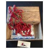 Wooden box of costume jewelry