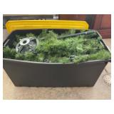 Artificial Christmas tree in tote