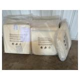 Cushions/ new in plastic