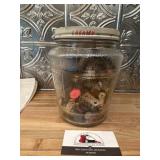 Glass jar of buttons