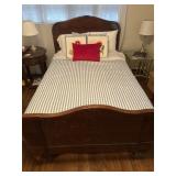 Antique full size bed frame with mattress and bed