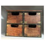 Primitive wooden cubbies with copper inlay