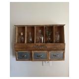 Primitive wooden shelf with glass jars