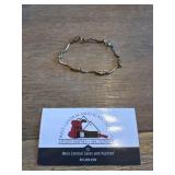 Bracelet- marked but unable to read