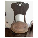 Antique leather bottom chair