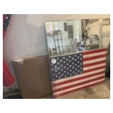 Wooden flag art and large mirror