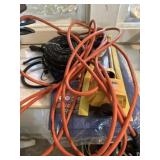 Sprinkler, tarp, rope, extension cord