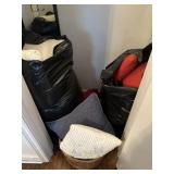 Throw pillows, mirror, and metal shelf