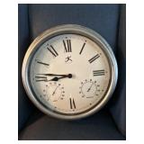 Wall clock and the thermometer