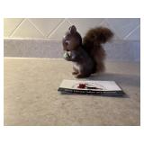Ceramic squirrel with fuzzy tail