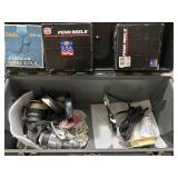Vintage fishing reels in tackle box
