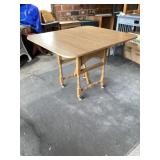 Drop leaf table on wheels Approximately 40' x 36