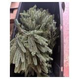Totes  of artificial tree