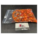 Quart bag of orange beads