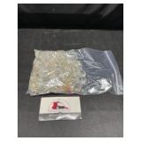 Partial bag of clear beads