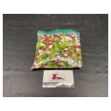 Sandwich baggie of Christmas colored beads