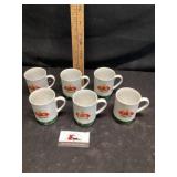 Trojan T X advertising coffee cups