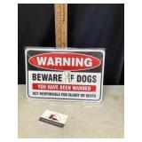 Metal warning beware of dogs sign